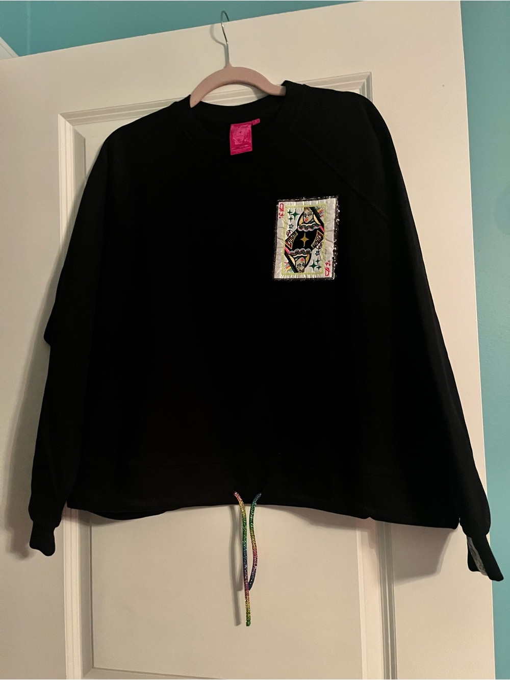 QUEEN OF SPARKLES Black card patch pullover with drawstring waist